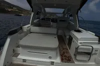 2024 Bavaria Sport 36 Open yacht interior with seating and ocean view.
