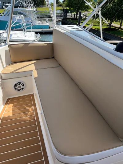 Rainmaker Yacht Photos Pics 2004 Ocean Yachts 40 SS boat with beige cushioned seating area.