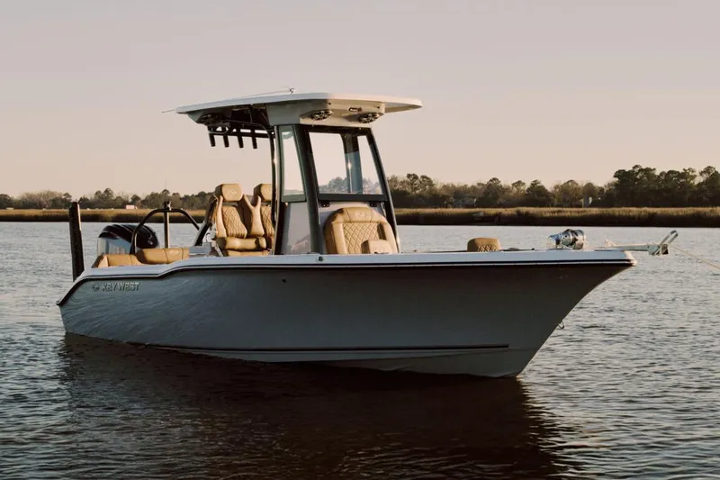  Yacht Photos Pics Manufacturer Provided Image: 2025 Key West 239 FSR boat on calm water at sunset.