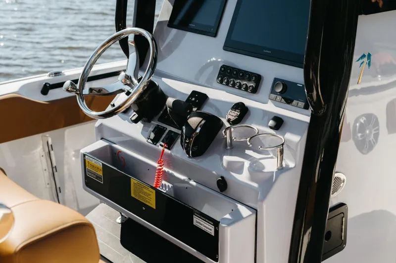  Yacht Photos Pics Manufacturer Provided Image: 2025 Key West 239 FSR boat dashboard with steering wheel and control panel.