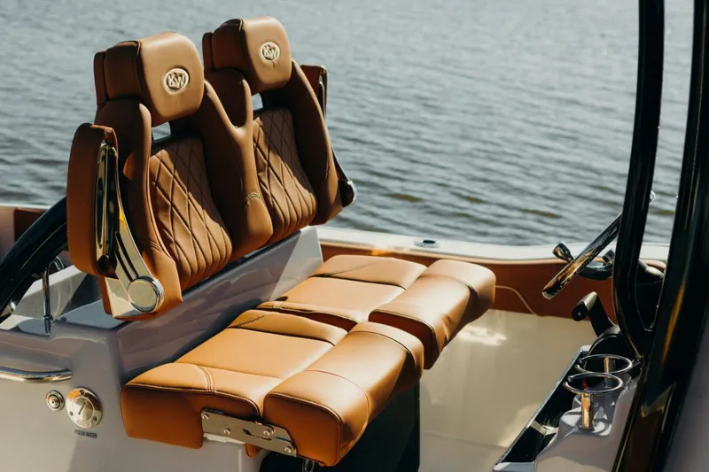  Yacht Photos Pics Manufacturer Provided Image: Luxurious seating on 2025 Key West 239 FSR boat, featuring brown leather upholstery.