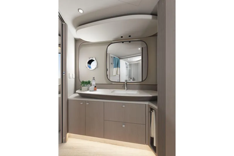  Yacht Photos Pics Luxurious bathroom interior of 2026 Absolute NAVETTA 58 yacht, featuring modern fixtures and elegant design.