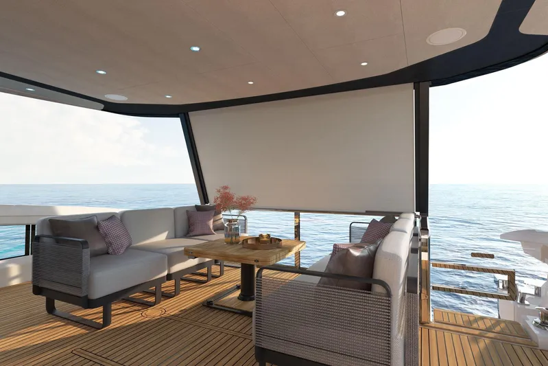  Yacht Photos Pics Luxurious 2026 Absolute NAVETTA 58 yacht deck with elegant seating and ocean view.