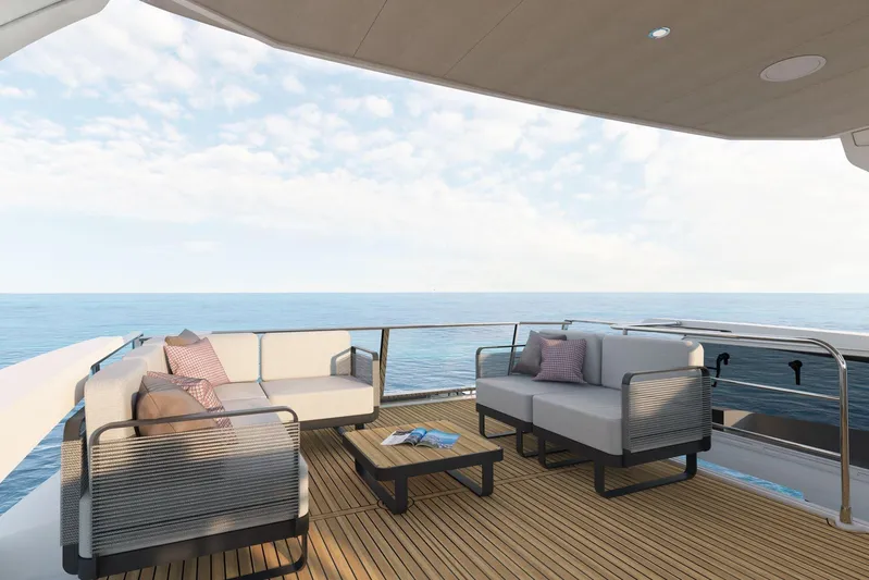  Yacht Photos Pics Luxurious deck seating on 2026 Absolute NAVETTA 58 yacht, overlooking serene ocean view.