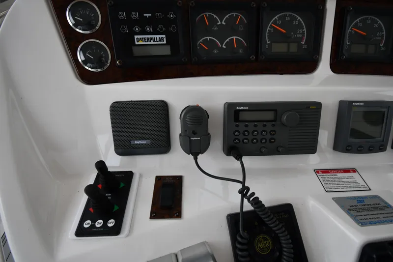 007 Yacht Photos Pics Control panel of a 2001 Sea Ray 480 Sedan Bridge with gauges and communication devices.