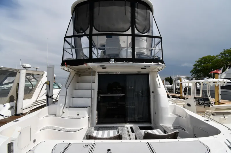 007 Yacht Photos Pics 2001 Sea Ray 480 Sedan Bridge yacht with spacious deck and enclosed upper helm.