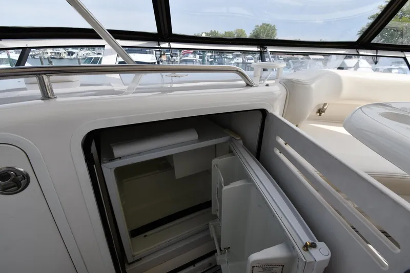 007 Yacht Photos Pics Open refrigerator on 2001 Sea Ray 480 Sedan Bridge yacht deck.