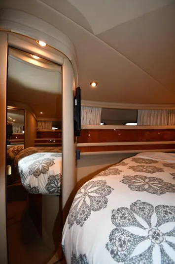 007 Yacht Photos Pics Luxurious cabin interior of 2001 Sea Ray 480 Sedan Bridge yacht with elegant bedding.