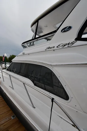 007 Yacht Photos Pics 2001 Sea Ray 480 Sedan Bridge yacht docked at marina.