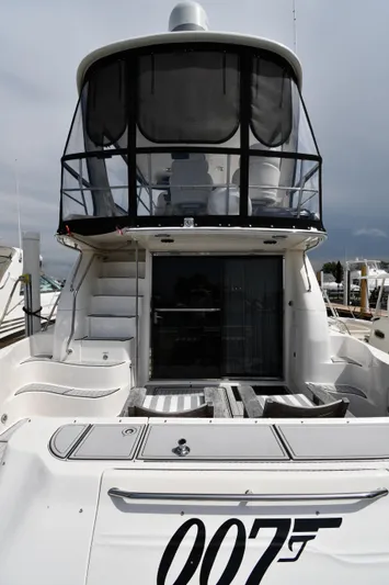 007 Yacht Photos Pics 2001 Sea Ray 480 Sedan Bridge yacht with distinctive "007" logo at the stern.