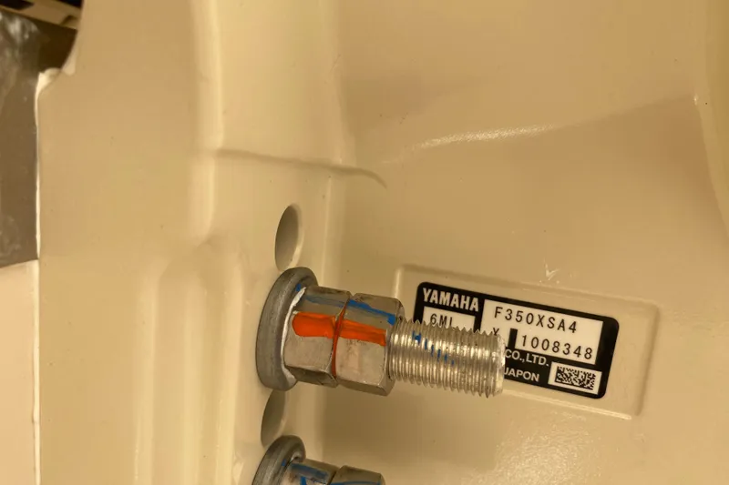  Yacht Photos Pics Close-up of Yamaha F350XSA4 engine part on 2026 Grady-White Canyon 306 boat.