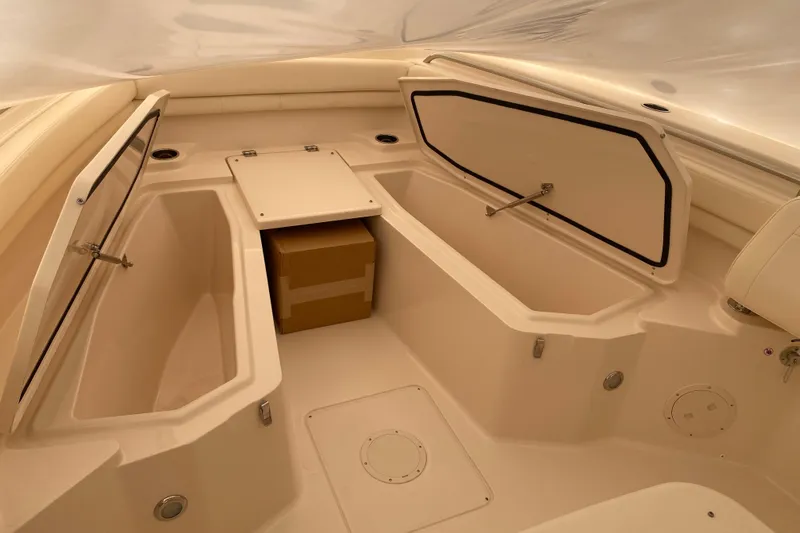  Yacht Photos Pics 2026 Grady-White Canyon 306 boat interior with open storage compartments.