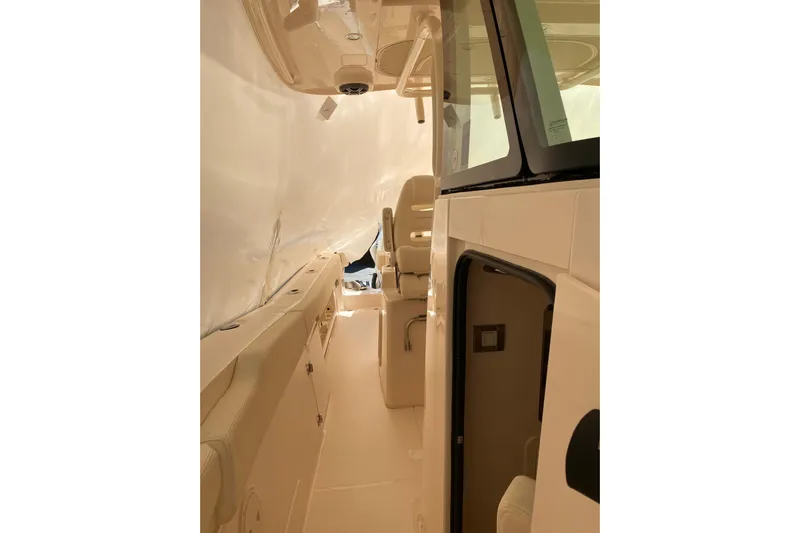  Yacht Photos Pics 2026 Grady-White Canyon 306 boat interior, featuring sleek design and comfortable seating.