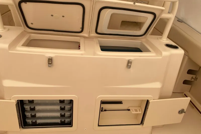  Yacht Photos Pics 2026 Grady-White Canyon 306 boat storage compartments and tackle boxes.