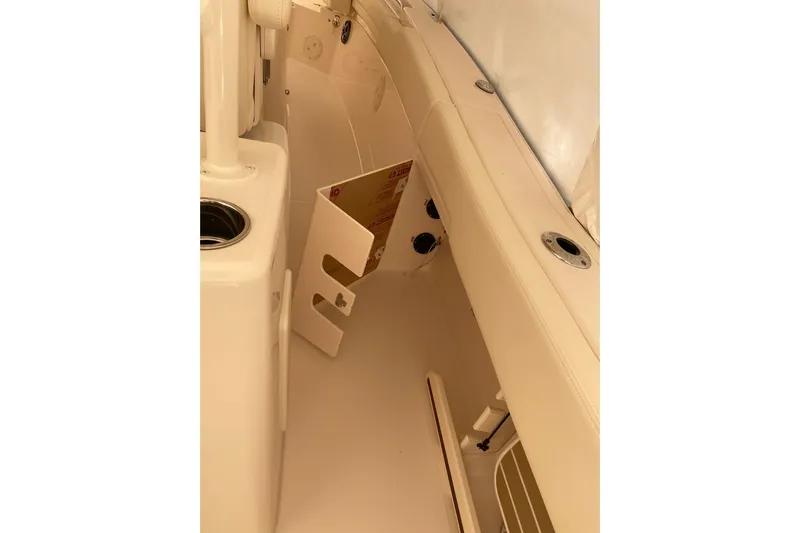  Yacht Photos Pics Interior view of 2026 Grady-White Canyon 306 boat, featuring sleek seating and storage.