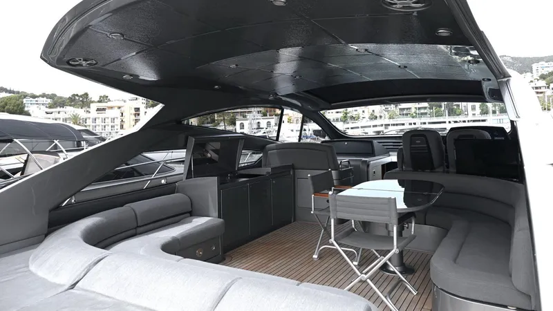 Oxygen III Yacht Photos Pics Luxurious 2007 Pershing 56 yacht interior with sleek seating and modern design.