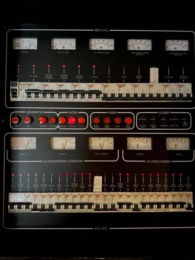 Oxygen III Yacht Photos Pics Control panel of a 2007 Pershing 56 yacht, featuring gauges and switches.
