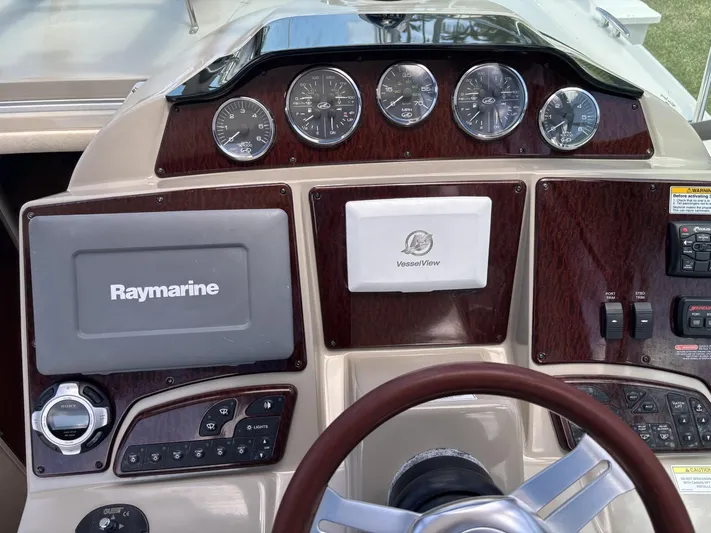 Mocaccino Yacht Photos Pics Control panel of 2011 Sea Ray 350 Sundancer with Raymarine and VesselView displays.