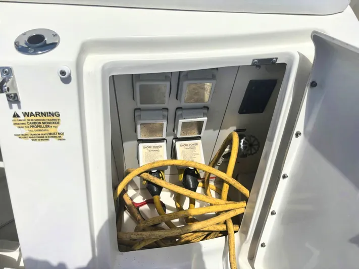 Mocaccino Yacht Photos Pics Electrical panel with yellow cables on a 2011 Sea Ray 350 Sundancer boat.