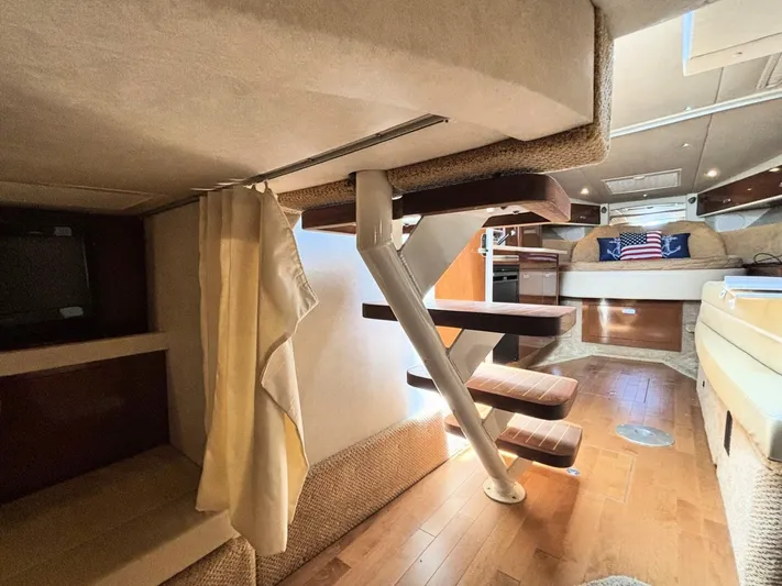 Mocaccino Yacht Photos Pics Interior of 2011 Sea Ray 350 Sundancer yacht with wooden flooring and modern staircase.