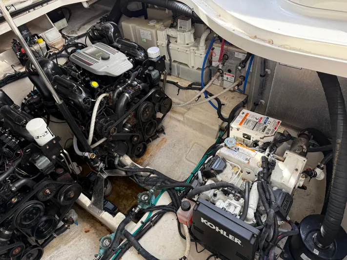 Mocaccino Yacht Photos Pics Engine room of 2011 Sea Ray 350 Sundancer with Kohler generator and dual engines.