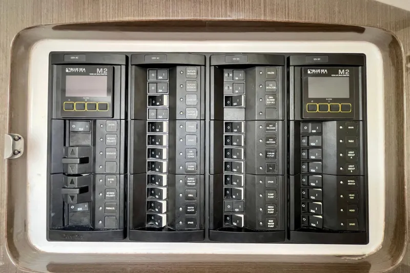  Yacht Photos Pics Electrical panel of a 2018 Intrepid 407 Cuddy boat with Blue Sea Systems M2 displays.