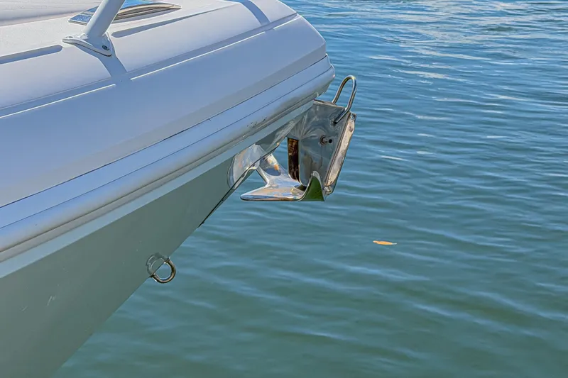  Yacht Photos Pics 2018 Intrepid 407 Cuddy boat anchor detail on calm water.