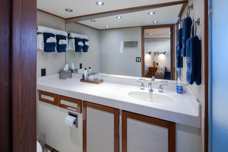 Silverado Yacht Photos Pics Luxurious bathroom in 1974 Willard 1201 yacht with elegant fixtures and plush towels.