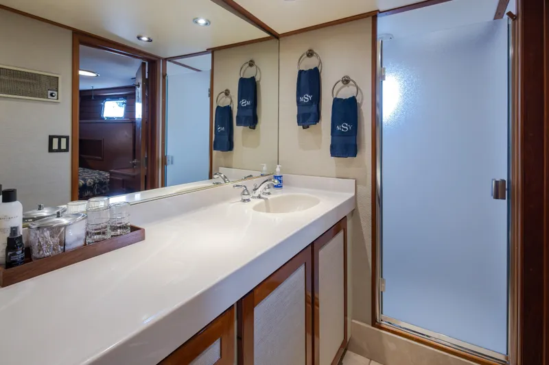 Silverado Yacht Photos Pics Luxurious bathroom in 1974 Willard 1201 yacht with modern amenities and elegant design.