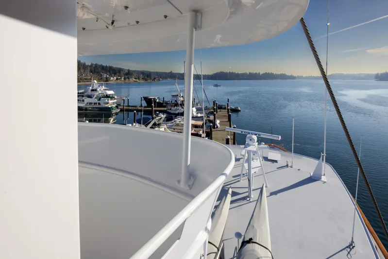 Silverado Yacht Photos Pics View from Willard 1201 yacht, 1974 model, overlooking serene marina and calm waters.
