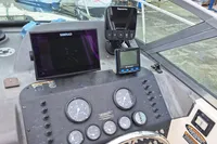 Dashboard of a 2000 Bayliner 2052 Trophy Walkaround DX/LX with navigation instruments and gauges.