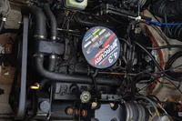 Engine compartment of a 2000 Bayliner 2052 Trophy Walkaround DX/LX with a 4.3L MerCruiser engine.