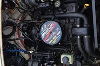 Engine compartment of a 2000 Bayliner 2052 Trophy Walkaround DX/LX with a 4.3L MerCruiser engine.