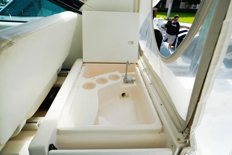 Sommertime Yacht Photos Pics 2005 Tiara Yachts 3800 Open sink area with cup holders and faucet.