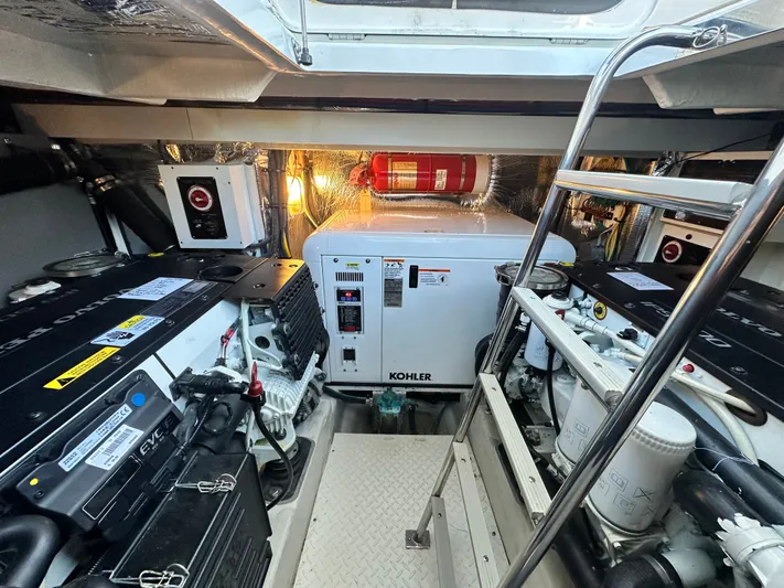The Seaker Yacht Photos Pics Engine room of 2015 Cruisers Yachts 41 Cantius with Kohler generator.