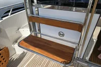 Wooden bench on a 2006 Nimbus 350 Coupe yacht deck.