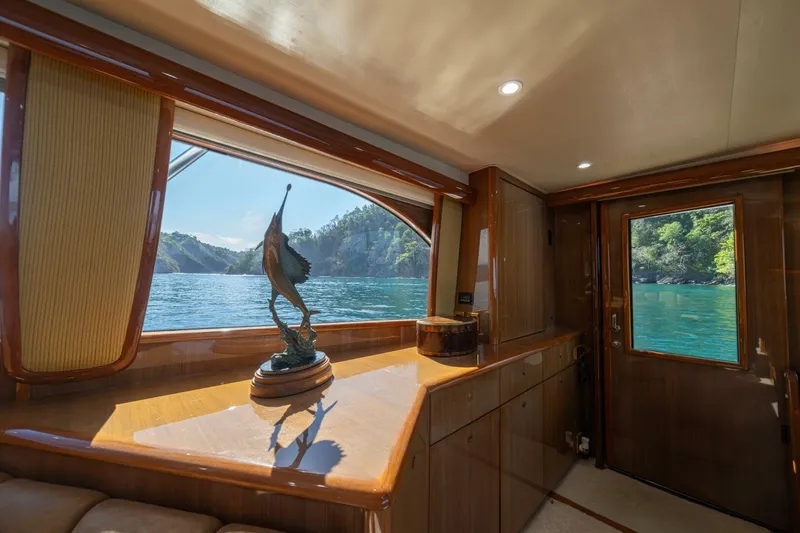 Scandaloso Yacht Photos Pics Luxurious interior of 2006 Viking 56 yacht with scenic ocean view.