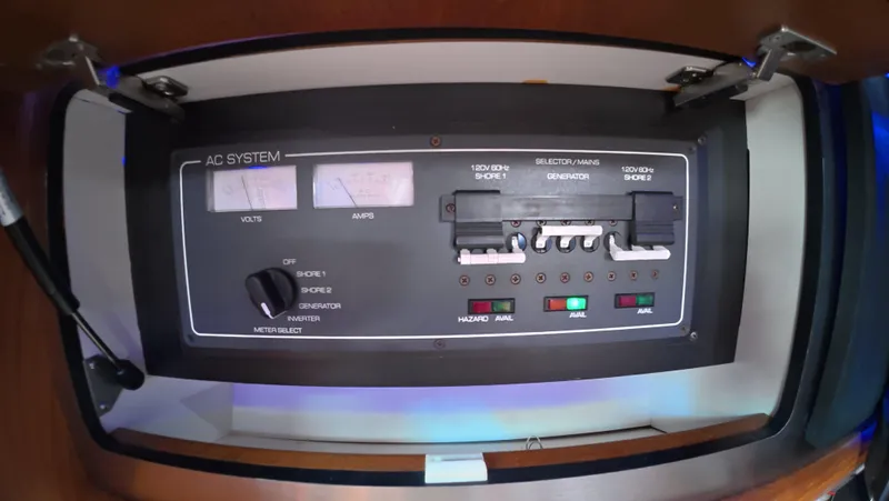  Yacht Photos Pics 2019 Tiara Yachts Sovran AC system control panel with gauges and switches.