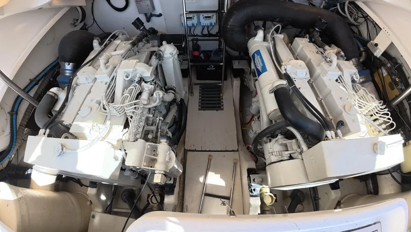  Yacht Photos Pics Engine room of 2019 Tiara Yachts Sovran, showcasing dual marine engines.
