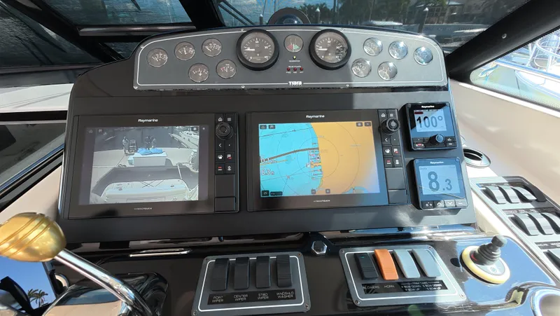  Yacht Photos Pics Control panel of 2019 Tiara Yachts Sovran with navigation and monitoring displays.