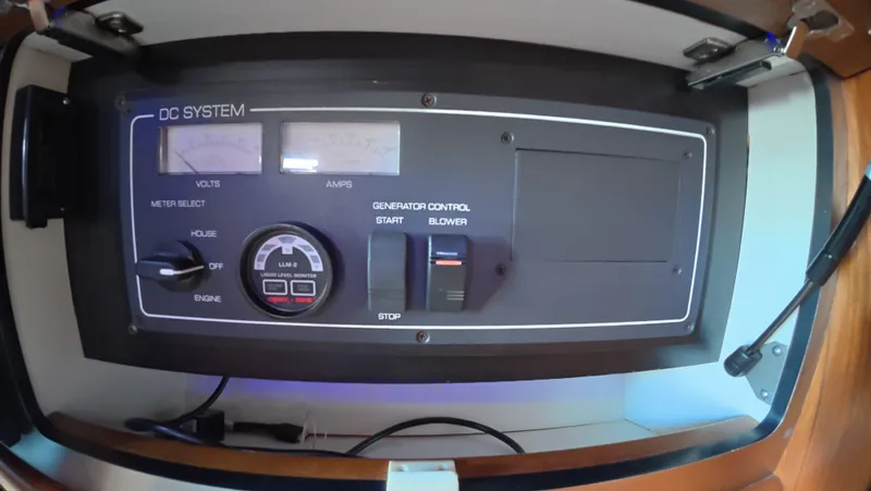  Yacht Photos Pics Control panel of a 2019 Tiara Yachts Sovran, featuring DC system and generator controls.