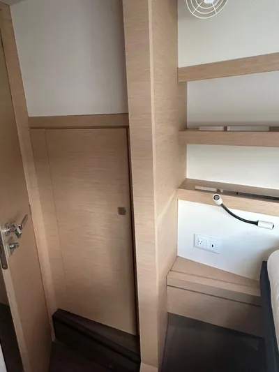 Vahevala Yacht Photos Pics Interior of 2019 Fountaine Pajot Lucia 40 yacht with wooden shelves and modern design.