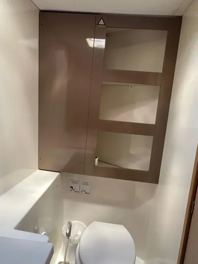 Vahevala Yacht Photos Pics 2019 Fountaine Pajot Lucia 40 yacht bathroom with modern fixtures and storage.