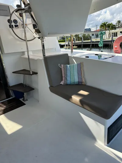 Vahevala Yacht Photos Pics 2019 Fountaine Pajot Lucia 40 yacht interior with seating and steering wheel.
