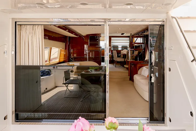  Yacht Photos Pics Luxurious interior of a 2009 Princess 23M yacht with elegant furnishings and modern design.