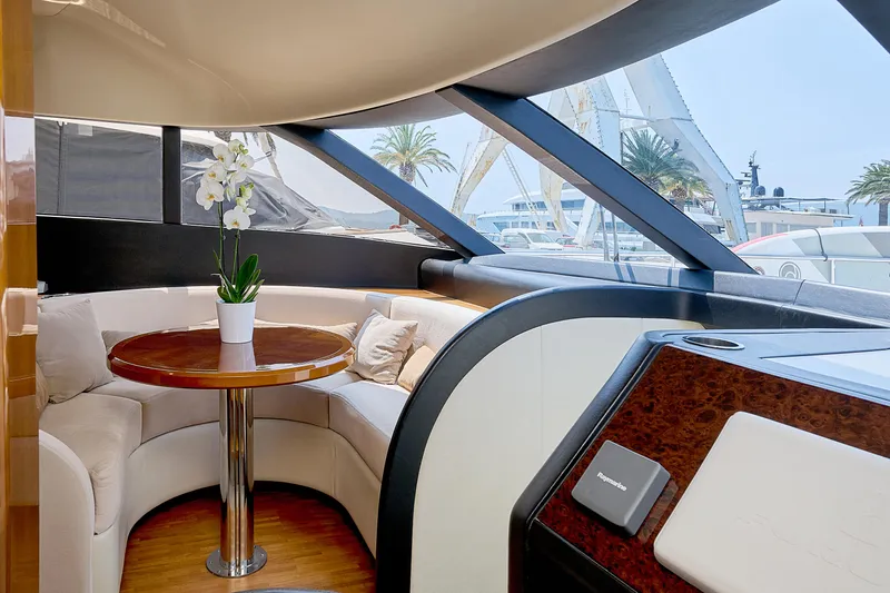  Yacht Photos Pics Luxurious interior of 2009 Princess 23M yacht with elegant seating and table.