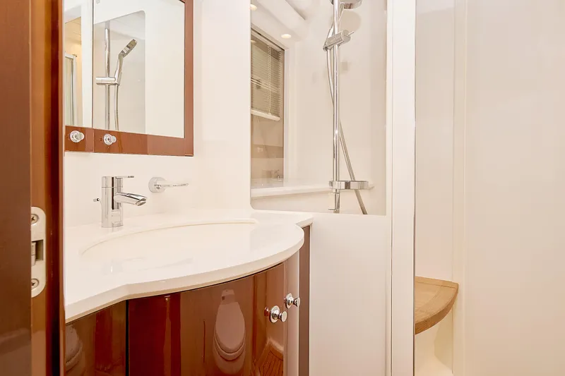  Yacht Photos Pics Luxurious bathroom in 2009 Princess 23M yacht with modern fixtures and elegant design.