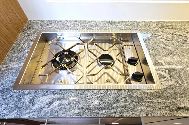 Magic Carpet Yacht Photos Pics 2 burner Dickenson gas stove and custom granite counters