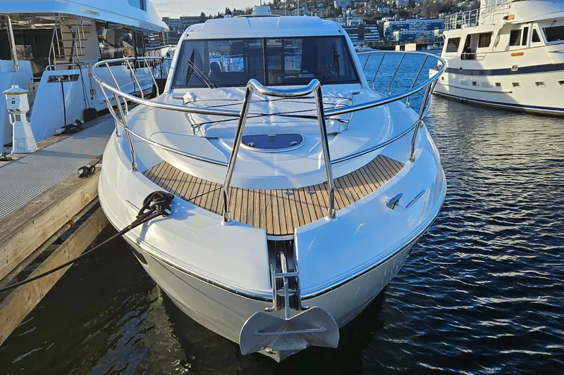 Magic Carpet Yacht Photos Pics 2015 Beneteau Gran Turismo 49 yacht docked at marina, bow view.