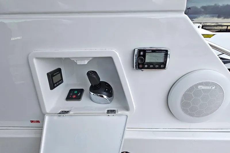 Magic Carpet Yacht Photos Pics Cockpit Joystick, Bow Thruster and Fusion Stereo Display and Control